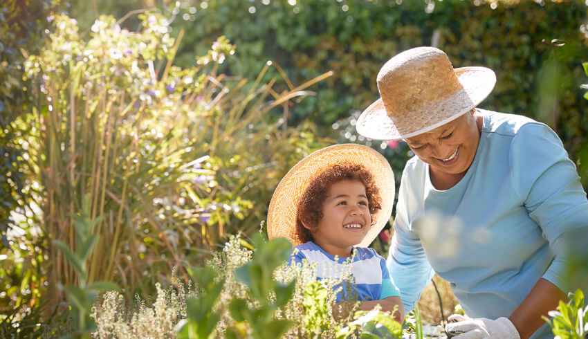 A woman and her grandchild in the garden